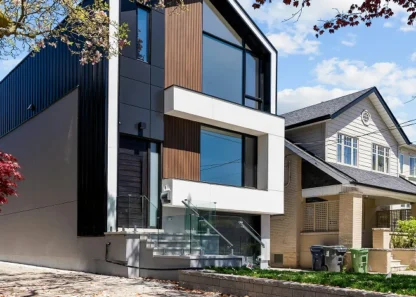 Modern urban house with large windows and sleek design